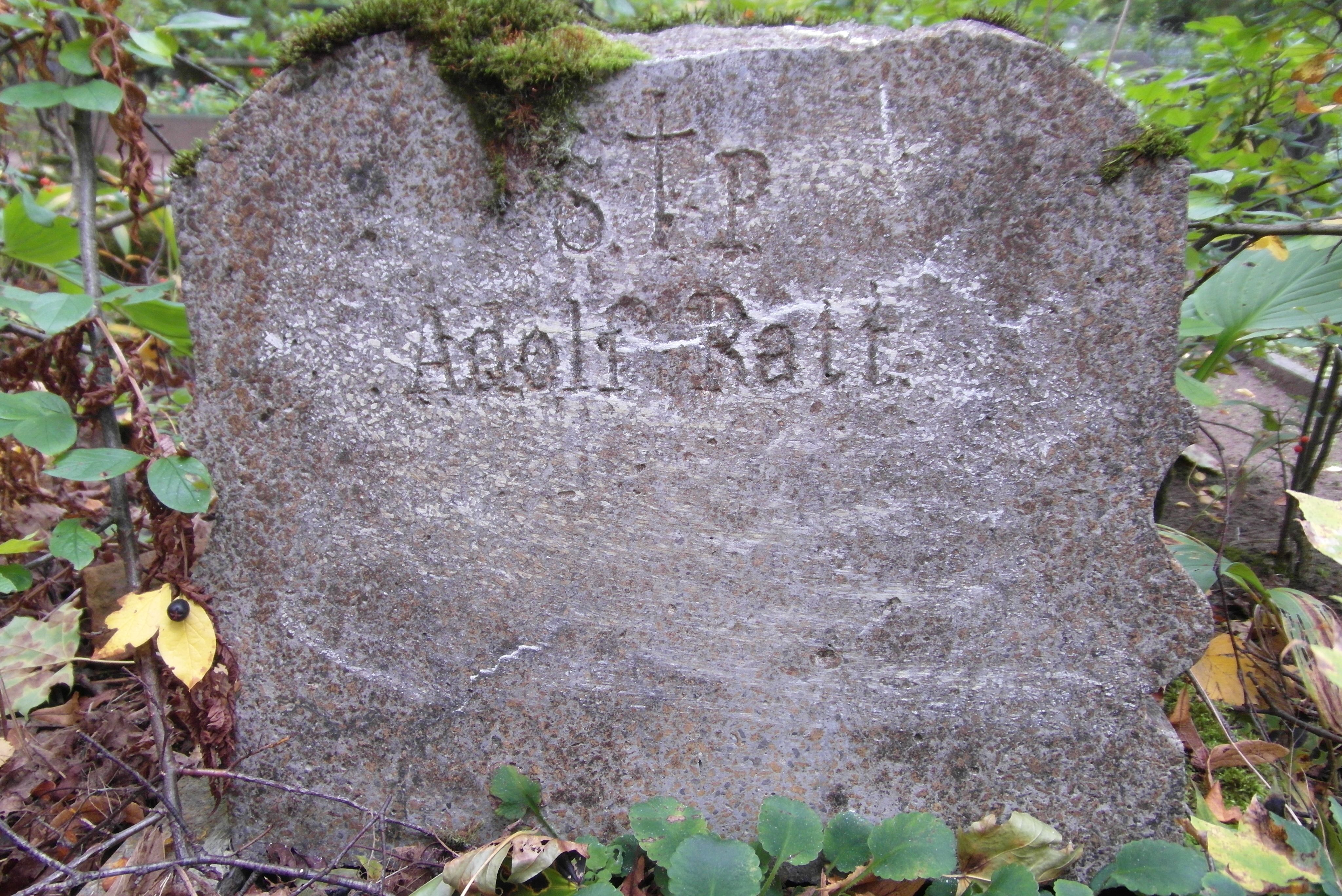 Inscription from the tombstone of Adolf Ratt, St Michael's cemetery in Riga, as of 2021.