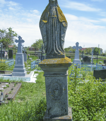 Nagrobek Anny Paługi, cmentarz w Poczapińcach