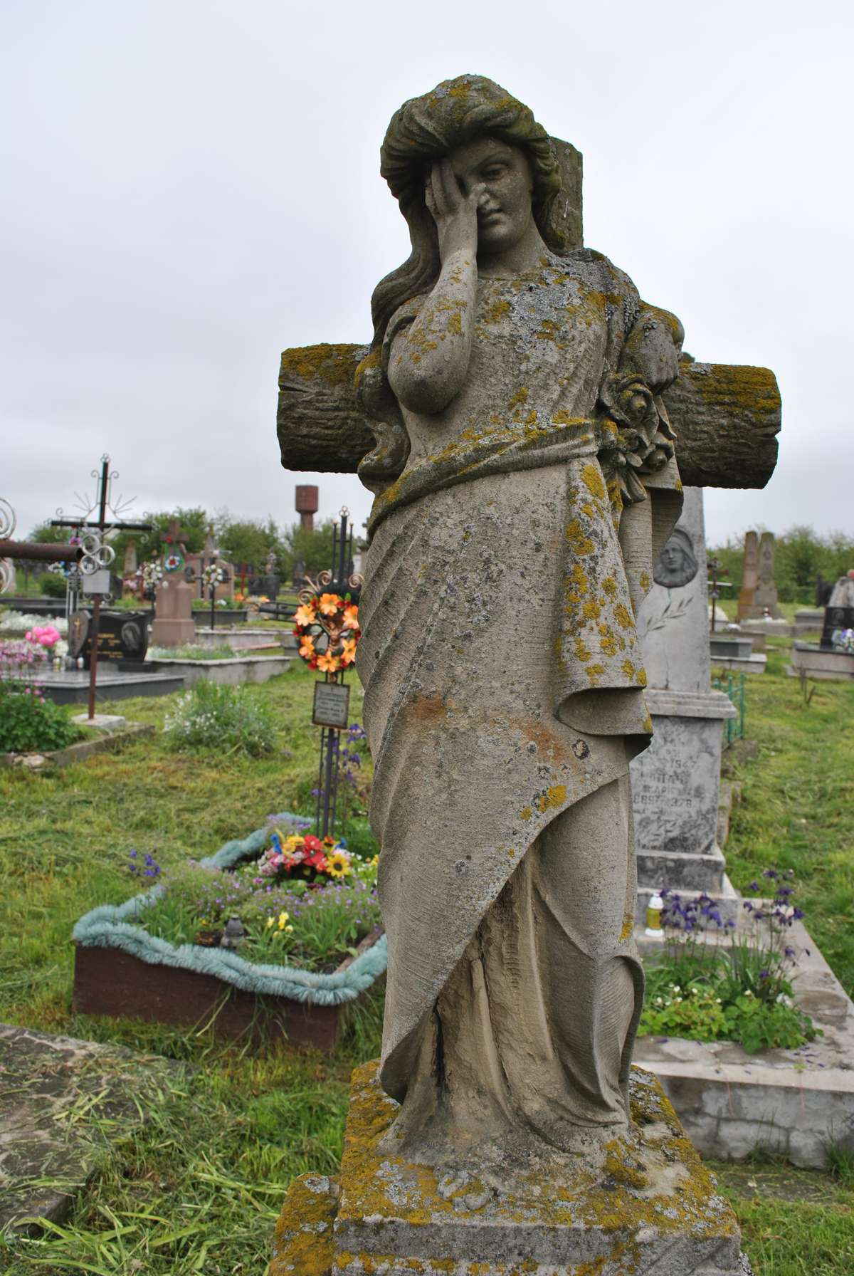 Statue from the gravestone of Maria Janina Guzik, cemetery in Hlubochok Wielki