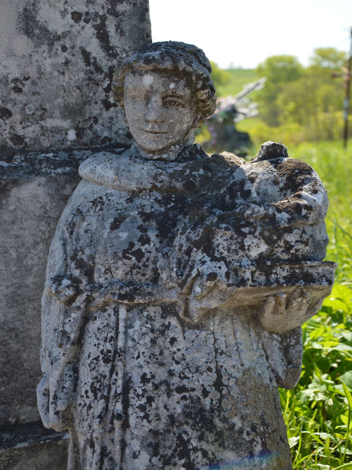 Figure from the gravestone of A[...] Bialowas, cemetery in Ihrowica