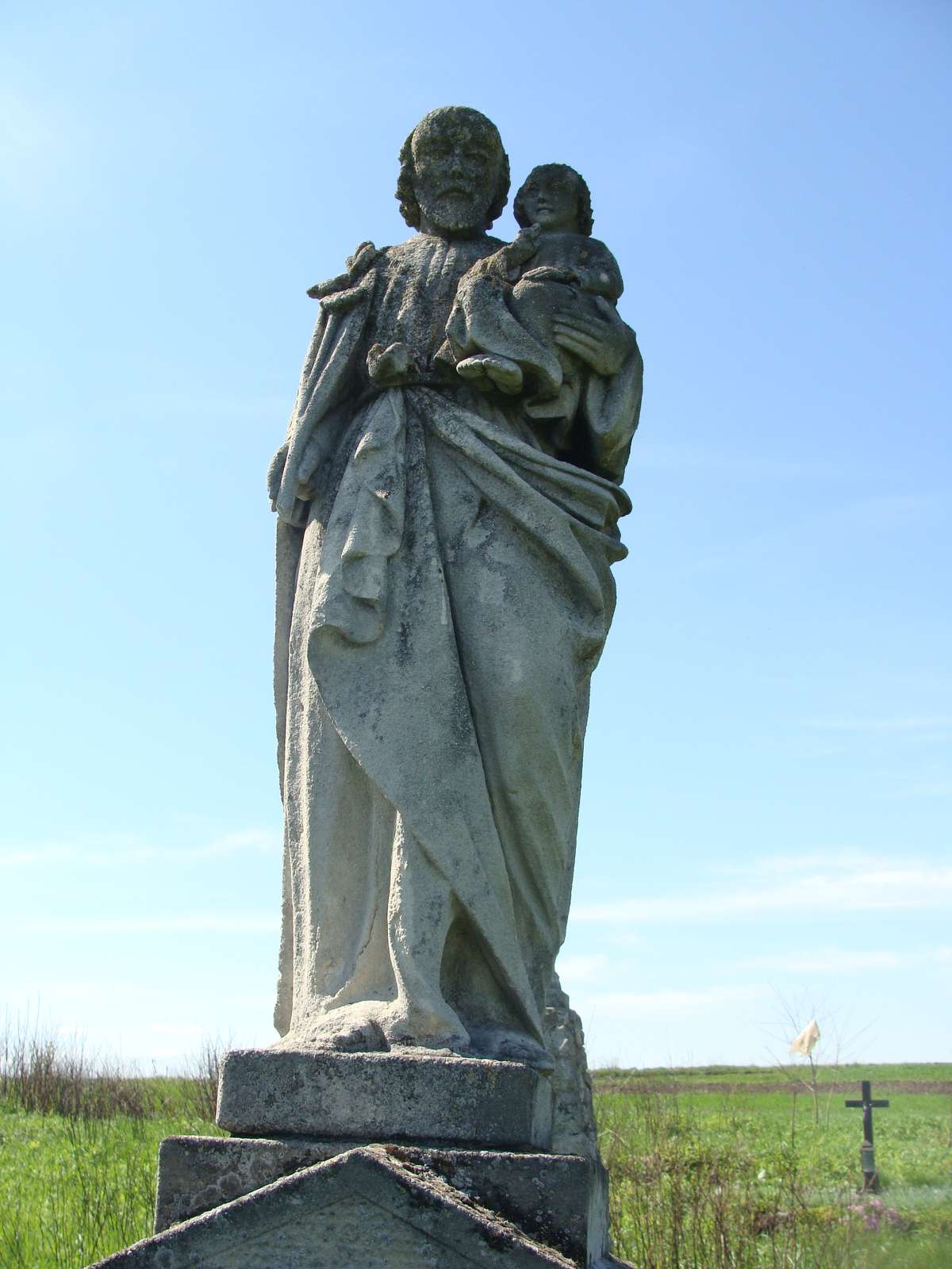 Statue from the gravestone of Franciszek Relczar, cemetery in Ihrownica