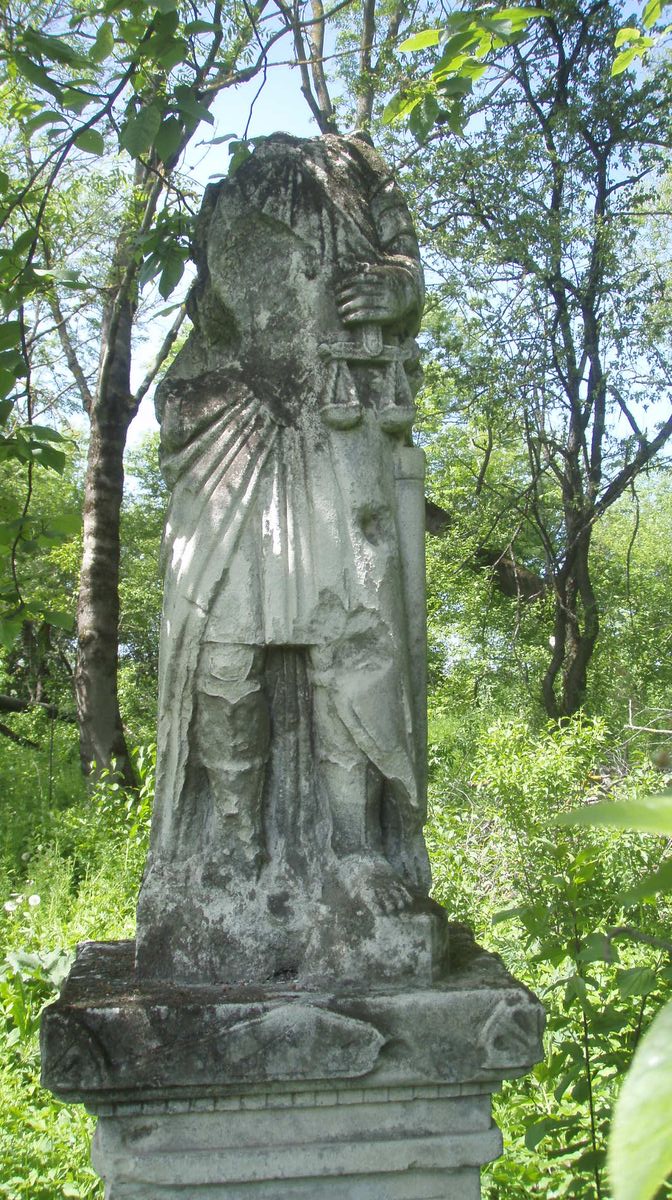 Figura z nagrobka Michała Glófki, cmentarz w Horodyszczach