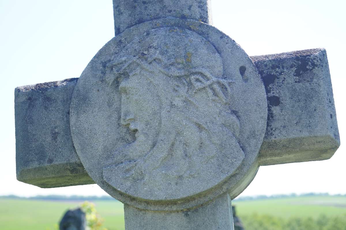 Bas-relief on the cross from the gravestone of Andrzej Wirga, cemetery in Łozowa