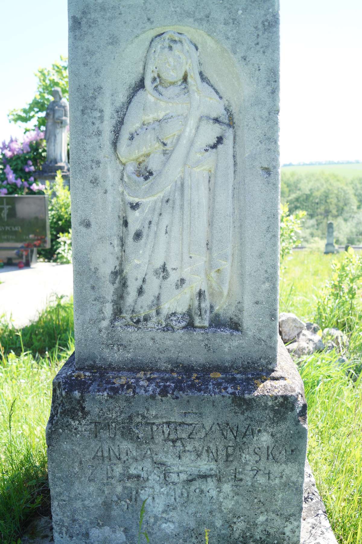 Bas-relief and inscription from the tombstone of Anna Tyneńska, cemetery in Łozowa