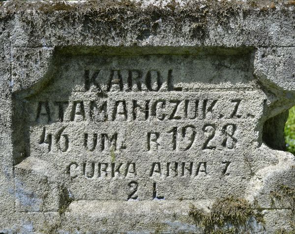 Inskrypcja z nagrobka Karola i Anny Atamanczuk, cmentarz w Horodyszczach