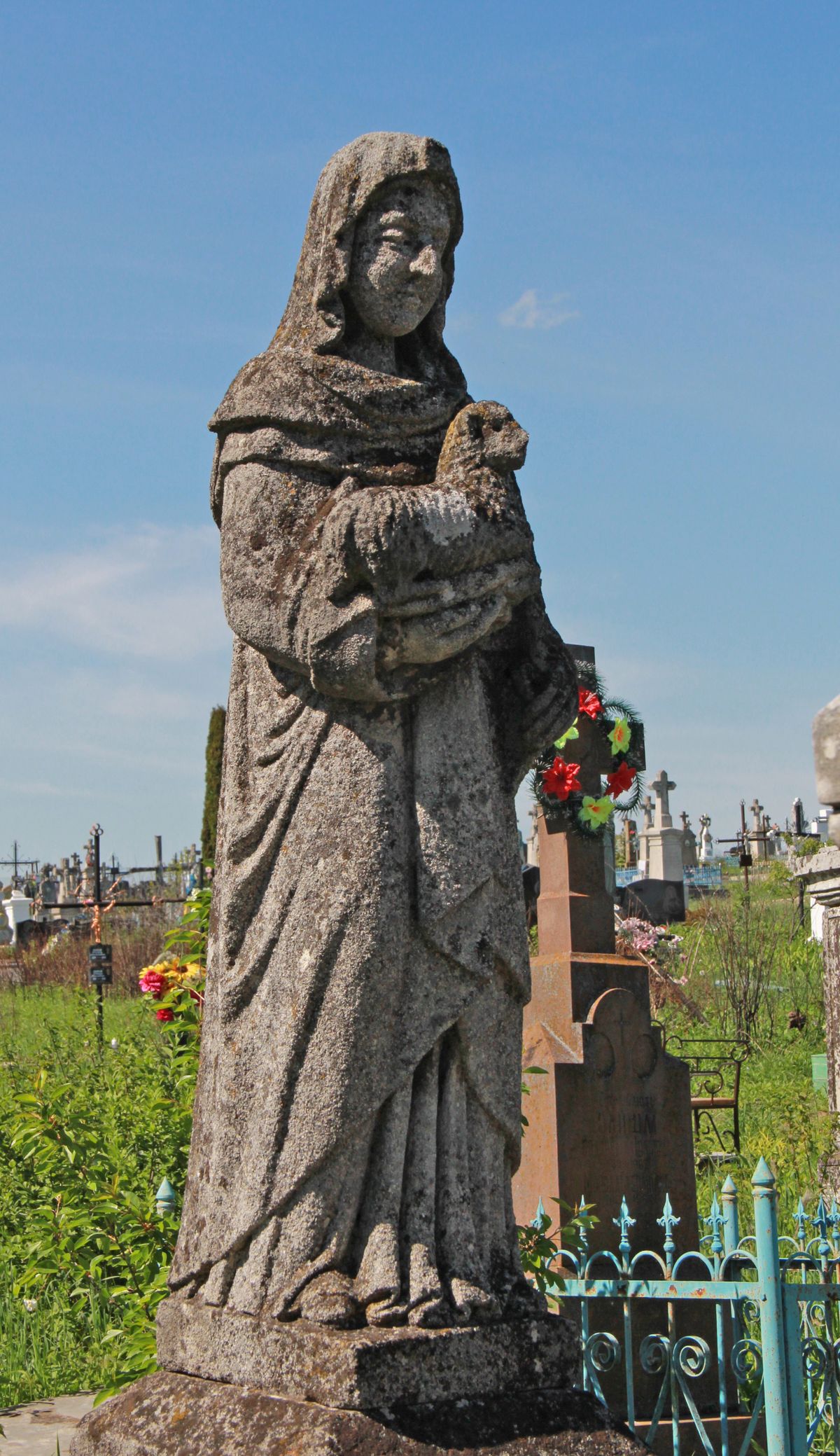 Figure from the tombstone of Agnes Deneka, cemetery in Ihrownica