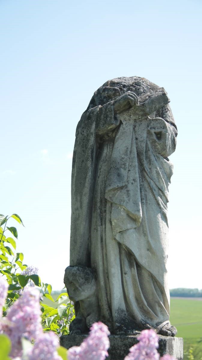 Statue of St. Luke from the gravestone of Lukasz Mazurkiewicz, Lozová cemetery