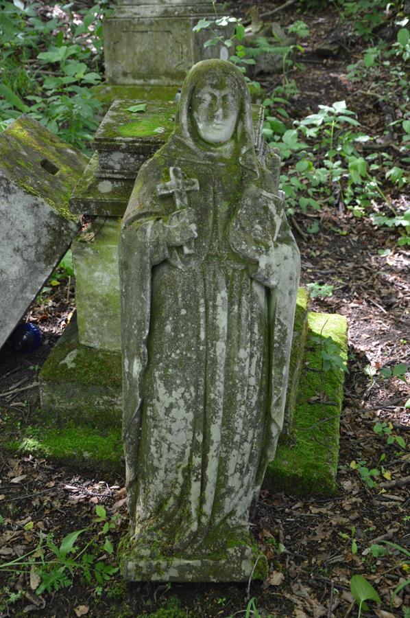 Figure from the gravestone of Eudoxja Dudar. Cemetery in Kokutkovce