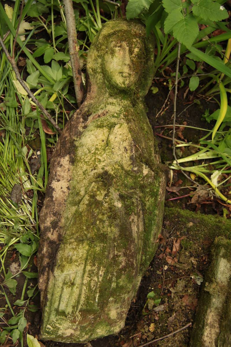 Figure from the gravestone of Agnieszka Stepek. Cemetery in Kokutkowce