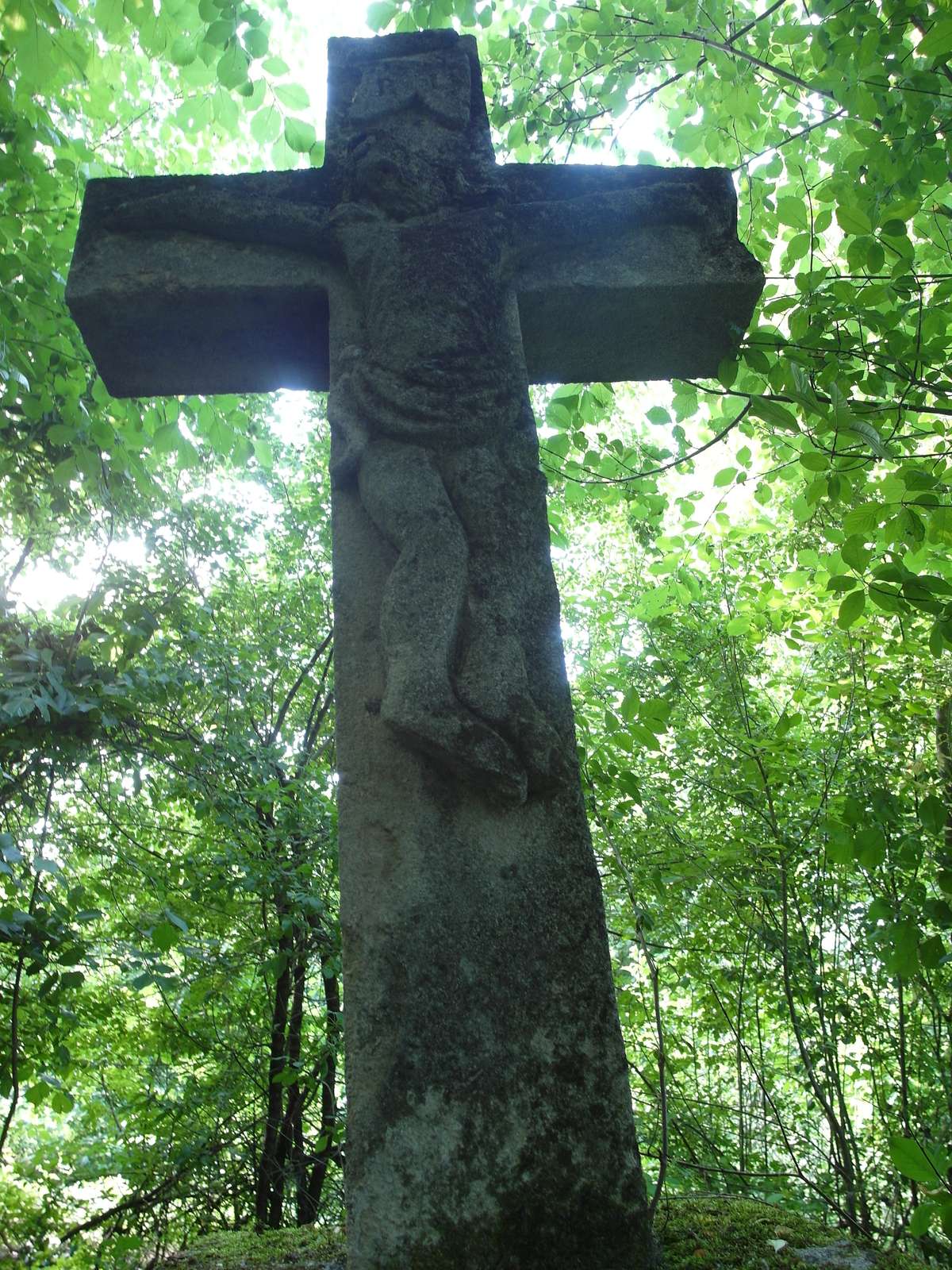 Cross from the gravestone of Wladyslaw Vlodzieniec. Cemetery in Kokutkowce