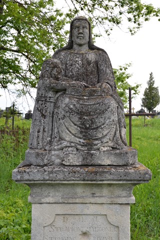 Statue from the gravestone of Anna Sawicka, cemetery in Smykowce