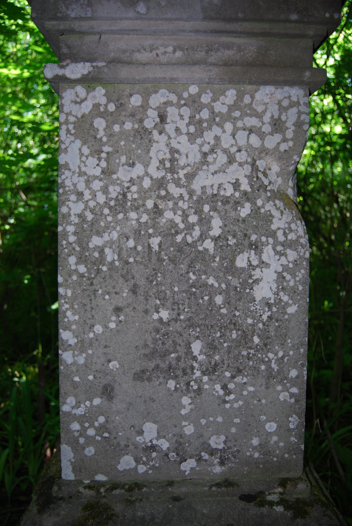 Fragment of a tombstone of Wicenty Mendrun, cemetery in Borki Wielkie