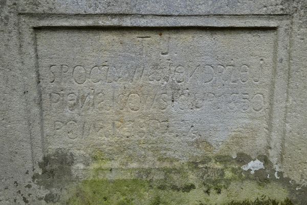 Inscription on the gravestone of Jędrzej Pieniakowski