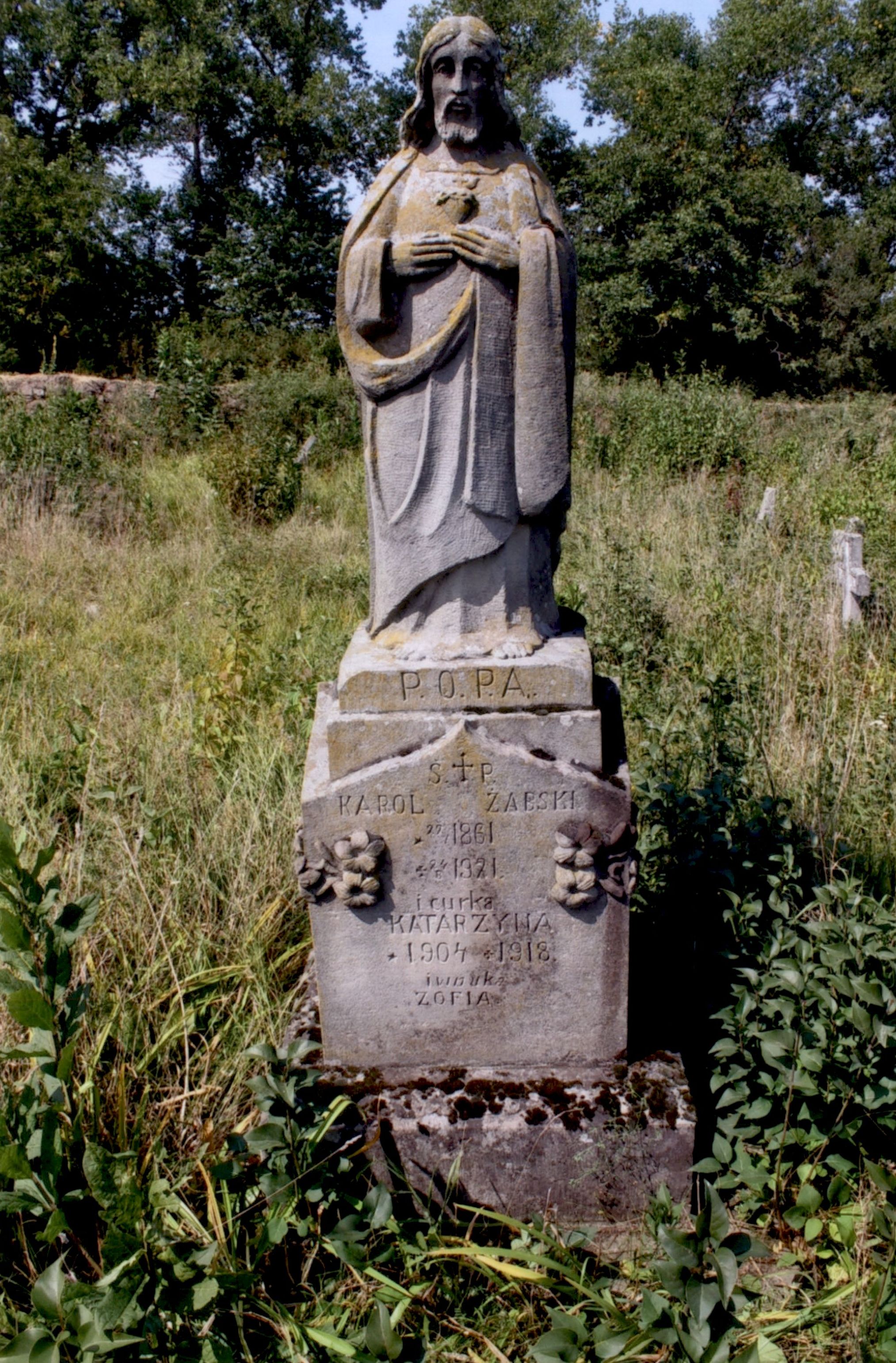 Tombstone of Karol, Katarzyna and Zofia Żabski, cemetery in Strusowo