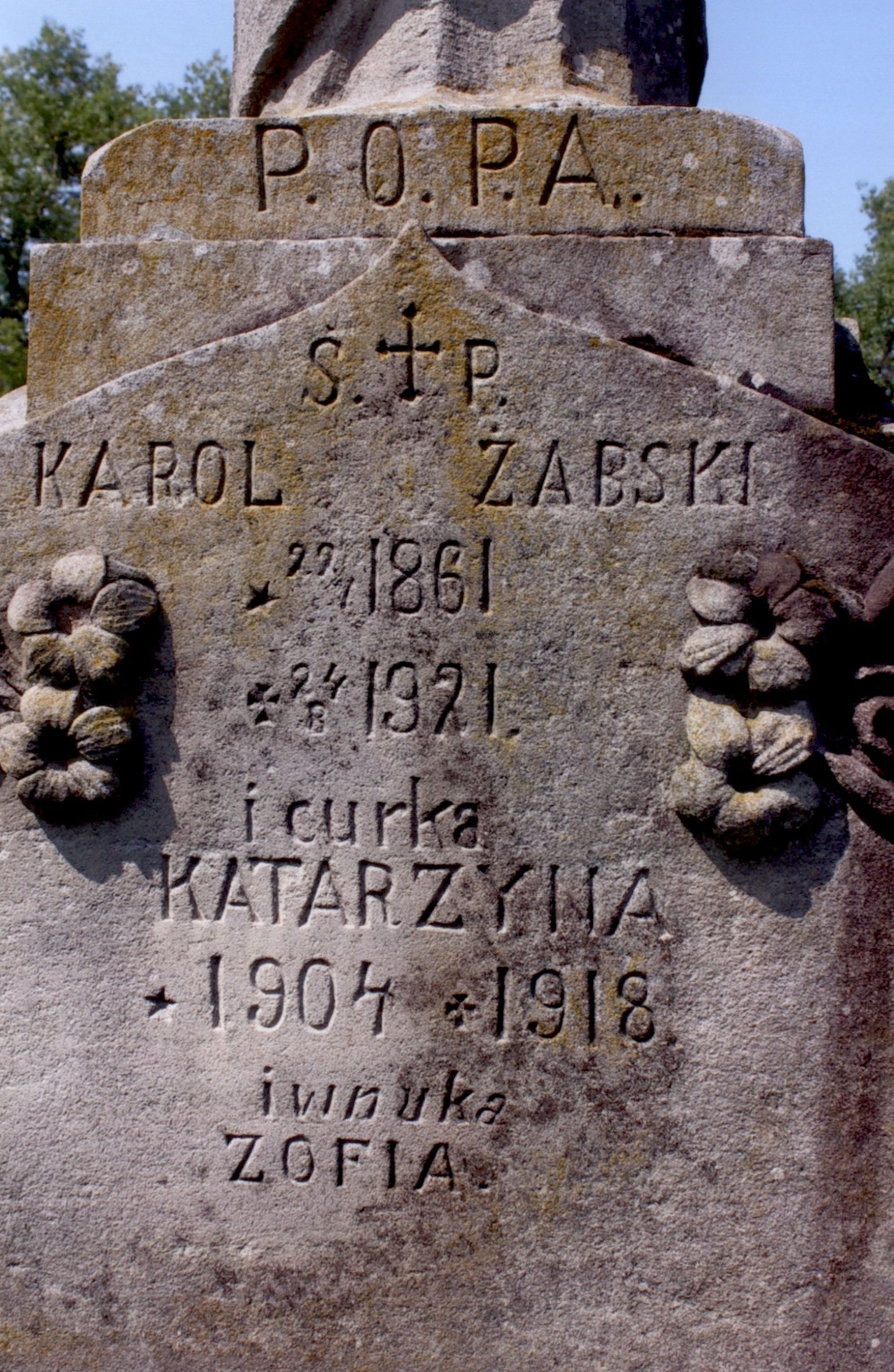 Tombstone of Karol, Katarzyna and Zofia Żabski, cemetery in Strusowo