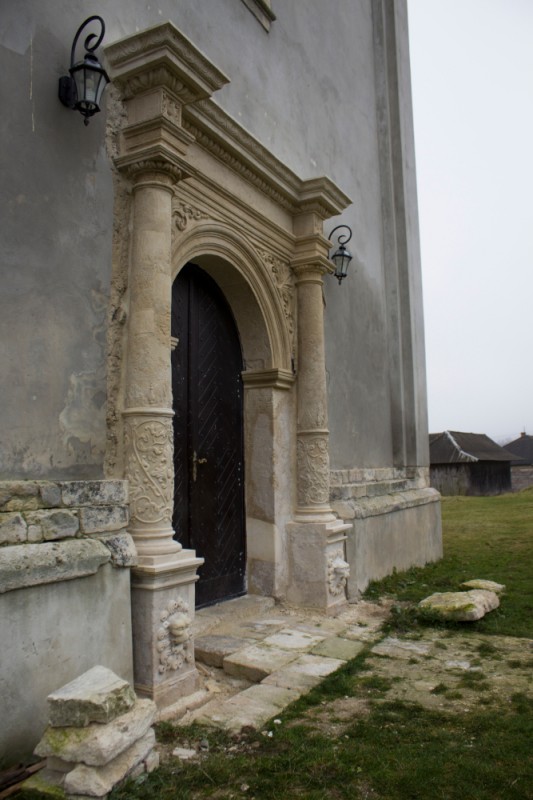 Entrance portal of the parish church of the Assumption of Mary in Būšėnai, Ukraine, 17th century after restoration