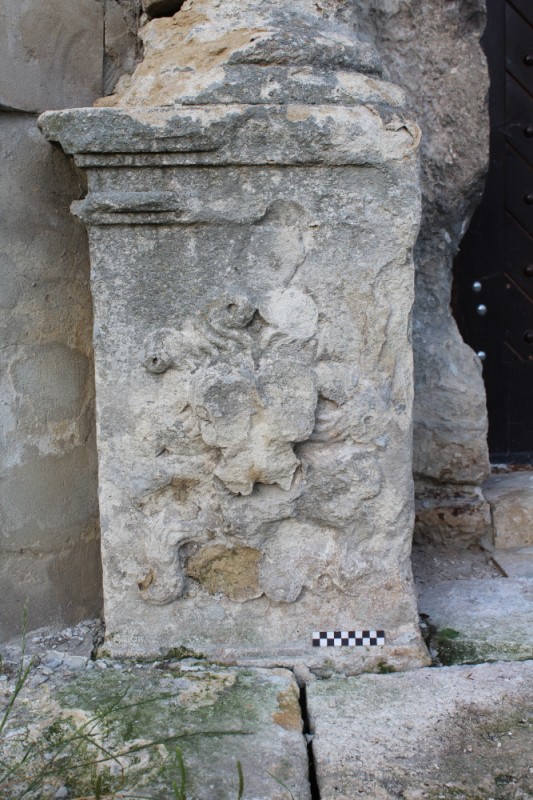 Entrance portal of the parish church of the Assumption of the Virgin Mary in Būšėnai, Ukraine, 17th century before restoration