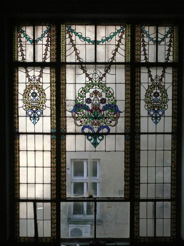 Stained-glass window from the former Hotel Krakowski in Lviv, before restoration