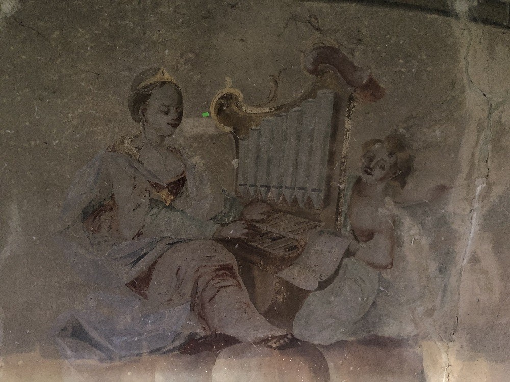 Painting in the Church of St. Stanislaus and St. Christopher in Hussakov, before restoration work