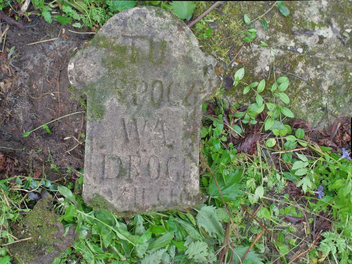 Broken arm of the cross from the gravestone of Stefania Popowicz, cemetery in Oprylovce