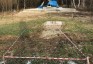 Photo showing Mass graves of victims of Stalinist repression, commemorated by a monument