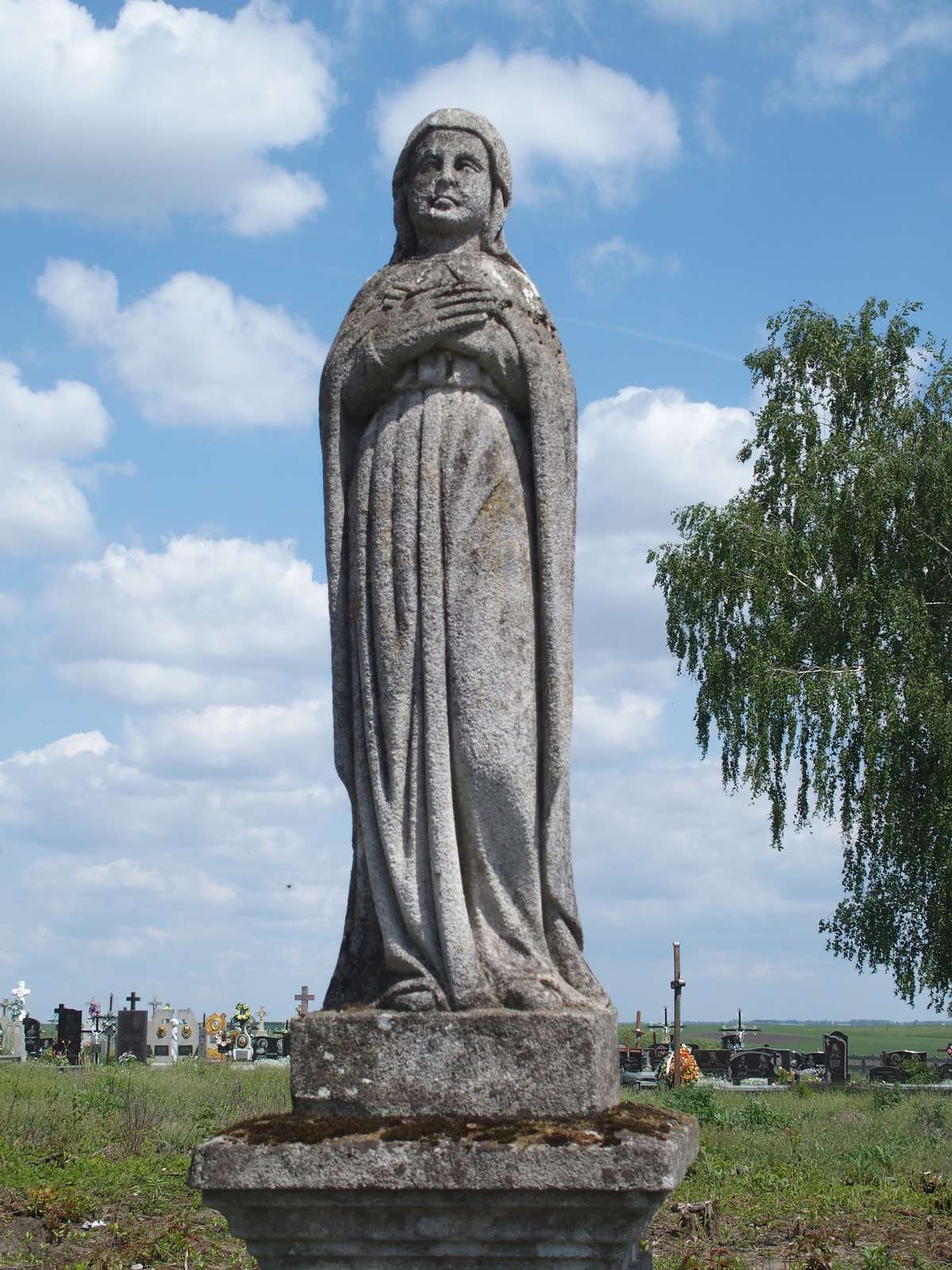 Fragment nagrobka rodziny Piotrowskich, cmentarz w Czernielowie Mazowieckim, cmentarz 1