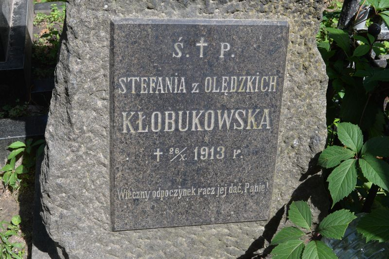 Fragment of Stefania Klobukovska's gravestone with visible inscription, Bajkova cemetery in Kiev, as of 2021.