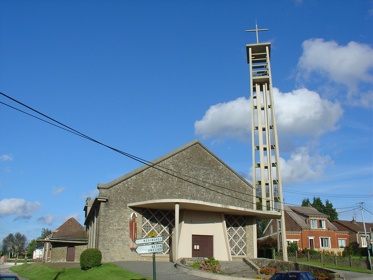 Saint-Germain Church in Fiefs with a sculpture by Jan Lambert-Rucki on the façade