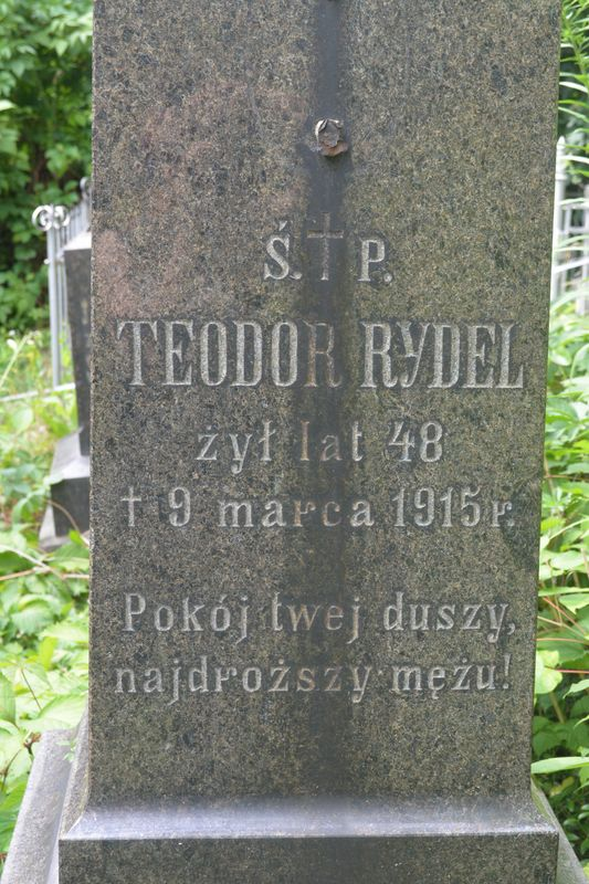 Fragment of Teodor Rydel's gravestone with visible inscription, Bajkova cemetery in Kiev, as of 2021.