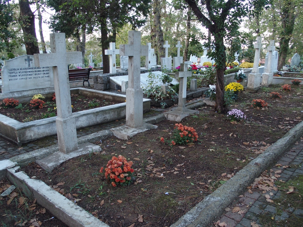 Tombstone of Bronislawa Kromer, Aleksandra, Franciszka, Sylwestra, Antoni, Stanislaw Wilkoszewski and N.N., Catholic cemetery in Adampol