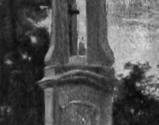 Posąg św. Jacka w Wilnie, z wysoką kolumną, na której szczycie znajduje się figura. Konstrukcja otoczona drzewami i drewnianym płotem.