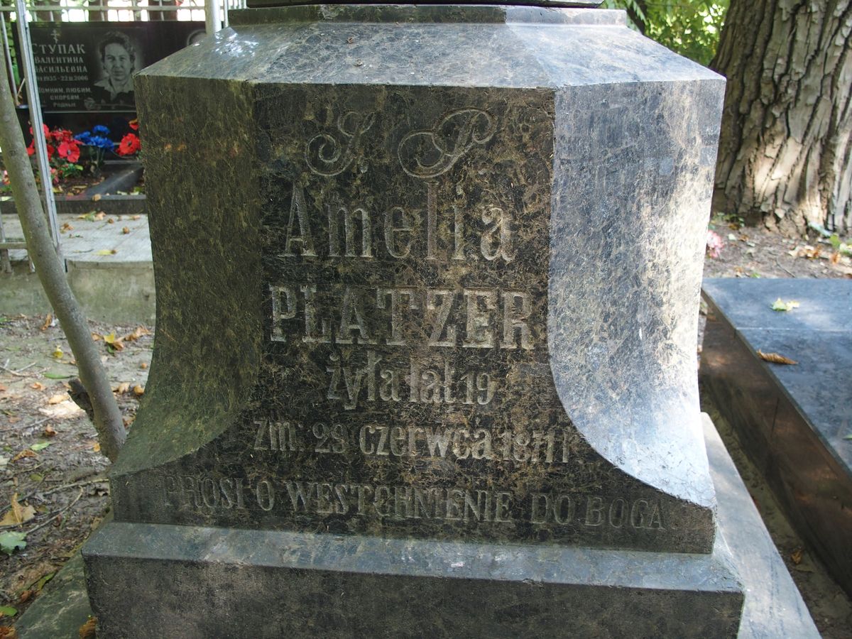 Fragment of Amelia Platzer's gravestone, with visible inscription, Baykova cemetery in Kiev, as of 2021.