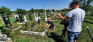 Fotografia przedstawiająca Cleaning work at the cemetery in Styrčy and Bielce in Moldova