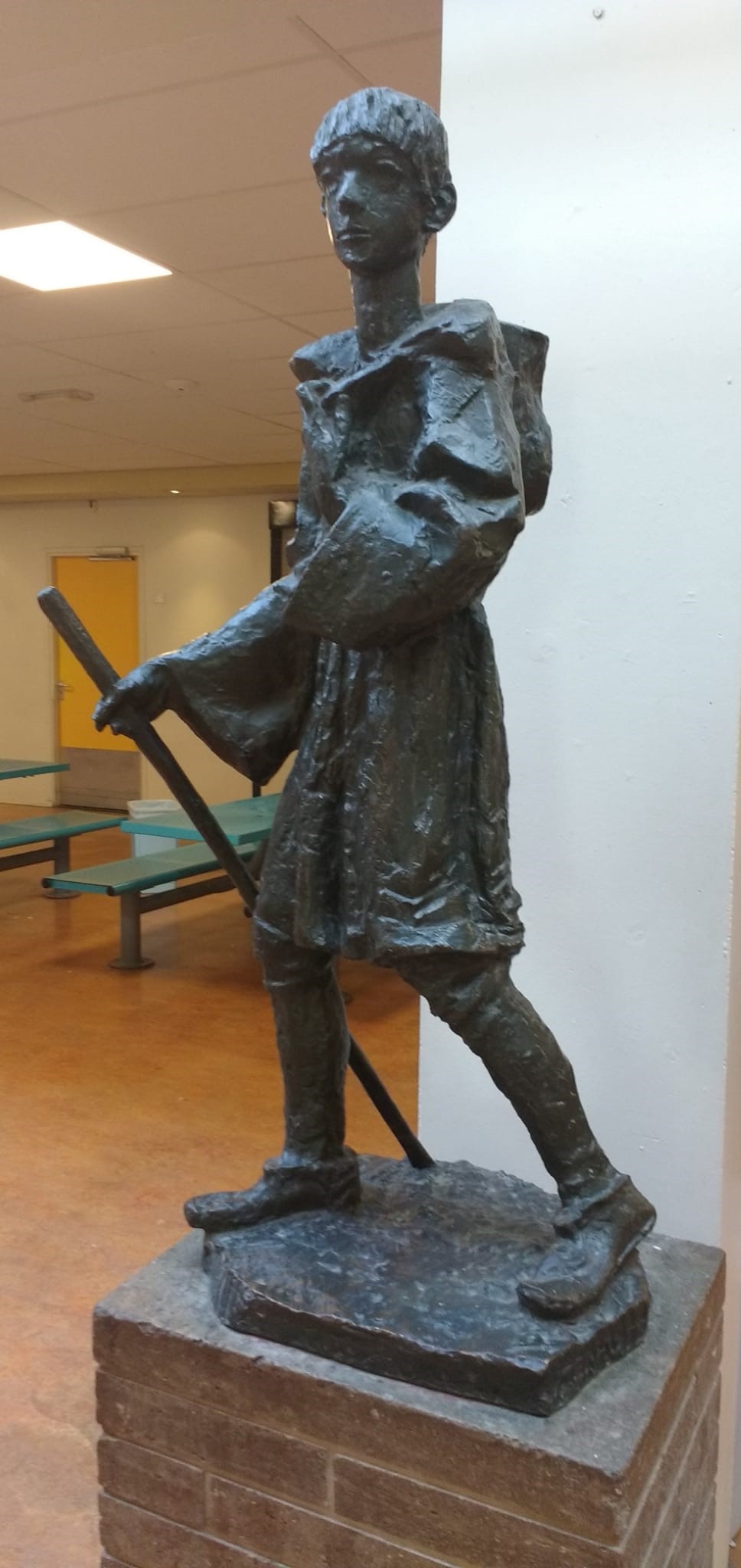 Fotografia przedstawiająca Sculpture of St Stanislaus Kostka at the Stanislascollege in Delft
