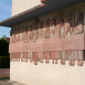 Photo montrant Bas-reliefs by Jean Lambert-Rucki on the façade of the Saint-Lazare church in Lèves