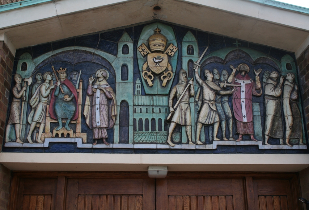 Fotografia przedstawiająca Tympanum with scene of the \'Martyrdom of St Thomas Becket\' at Rainham