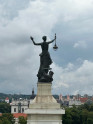 Fotografia przedstawiająca \"Elektra\" - sculpture by Boleslaw Balzukevich on the roof of the power station in Vilnius