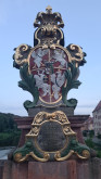 Fotografia przedstawiająca Coat of arms of the Polish-Lithuanian Commonwealth on the Pöppelmann Bridge in Grimm