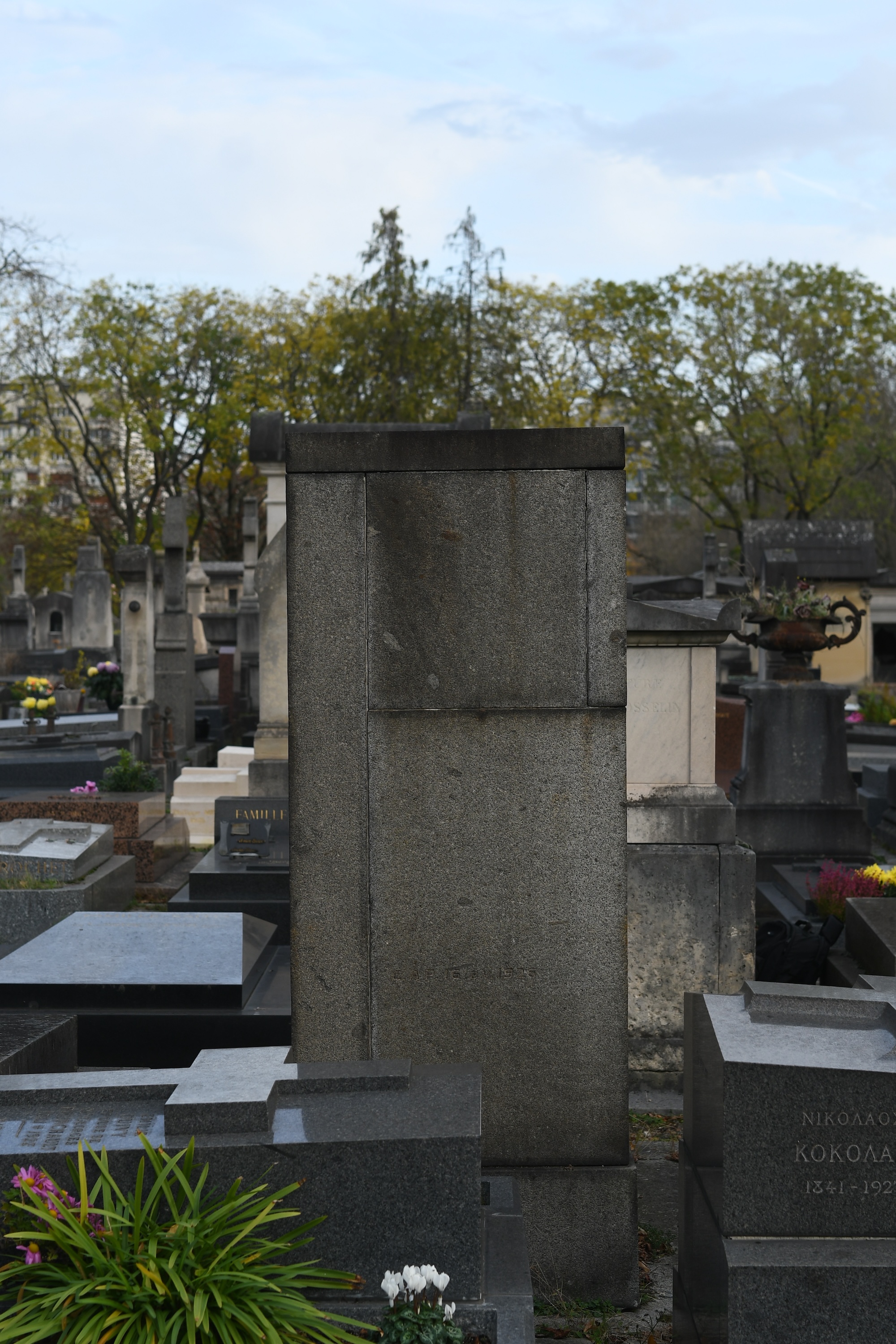 Photo showing Eugene Zak\'s work in foreign collections and his tombstone in Montparnasse cemetery