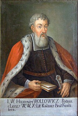 Portrait of Jerome Vollovich wearing a robe with fur trim, holding a book. An inscription bearing his name is visible at the bottom.