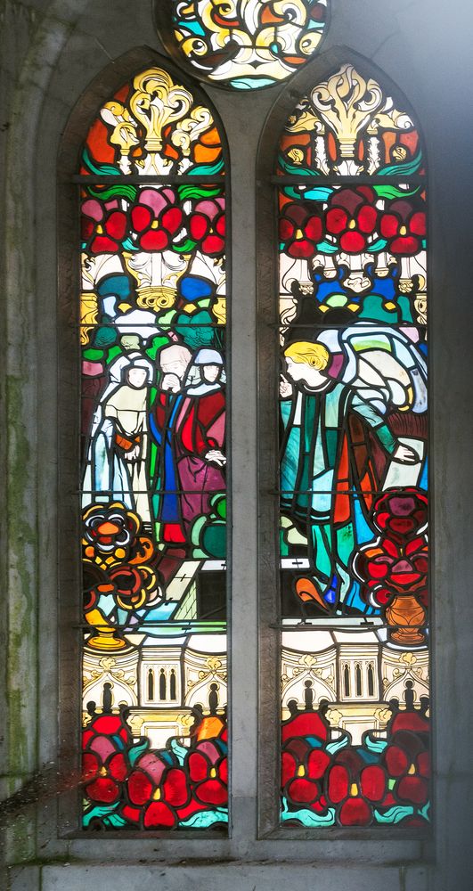 Jozef Mehoffer's stained glass windows in the Grauer family chapel in Opava, depicting figures in vivid colours with floral and architectural motifs. The scenes are framed by Gothic arches.