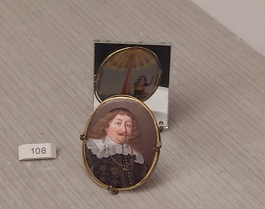 Miniature of King Ladislaus IV Vasa by Paul Prieur, 1645, in Gemäldegalerie Berlin. The king is in ornate attire with the Order of the Golden Fleece chain and a purple headpiece. Displayed on a light surface with a mirror behind.