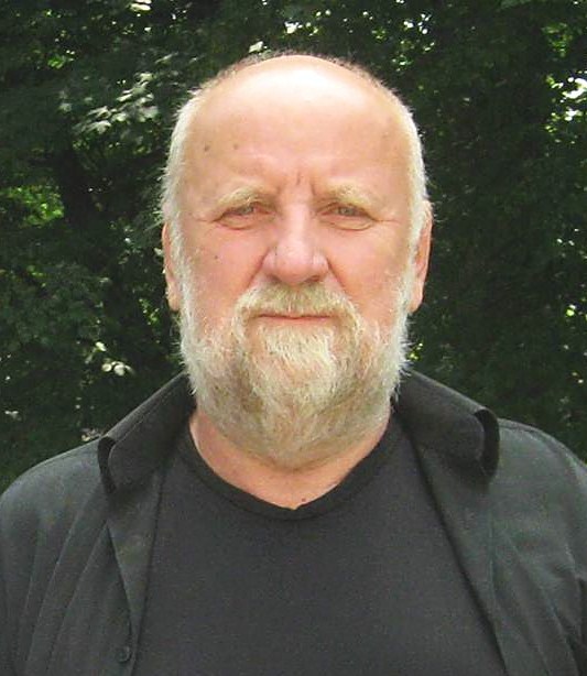 Fotografia przedstawiająca Adam Myjak