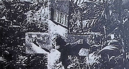 Nagrobek z krzyżem na cokole. Krzyż z reliefem Chrystusa na przecięciu ramion, powyżej napis 'INRI'. Cokół ma ścięte górne krawędzie i tablicę z inskrypcją.