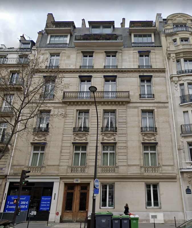 View of the façade of a 19th century townhouse, Paris 170 bis on Boulevard Haussmann, public domain