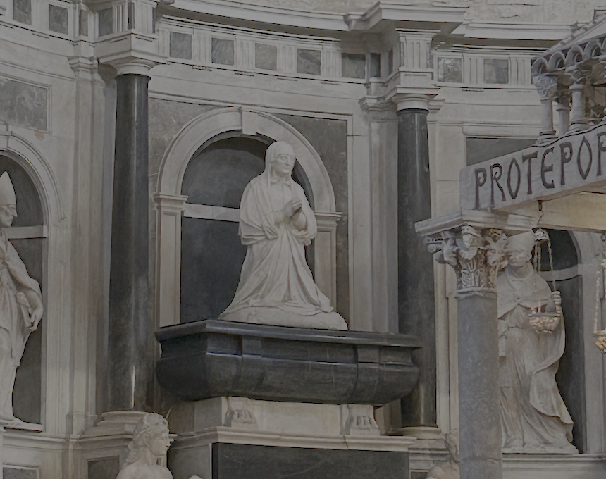 Tomb of Queen Bona Sforza in Bari's Basilica of St. Nicholas. The monument features a kneeling figure of the queen on a black sarcophagus, surrounded by columns and niches with statues of saints.