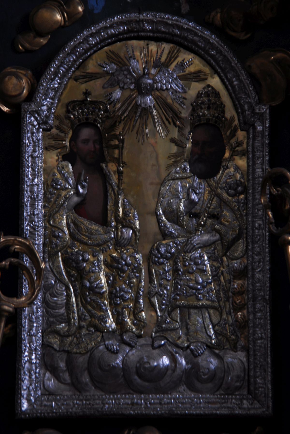 Fragment of an altarpiece decorated with cloths from the Latin Cathedral in Lviv