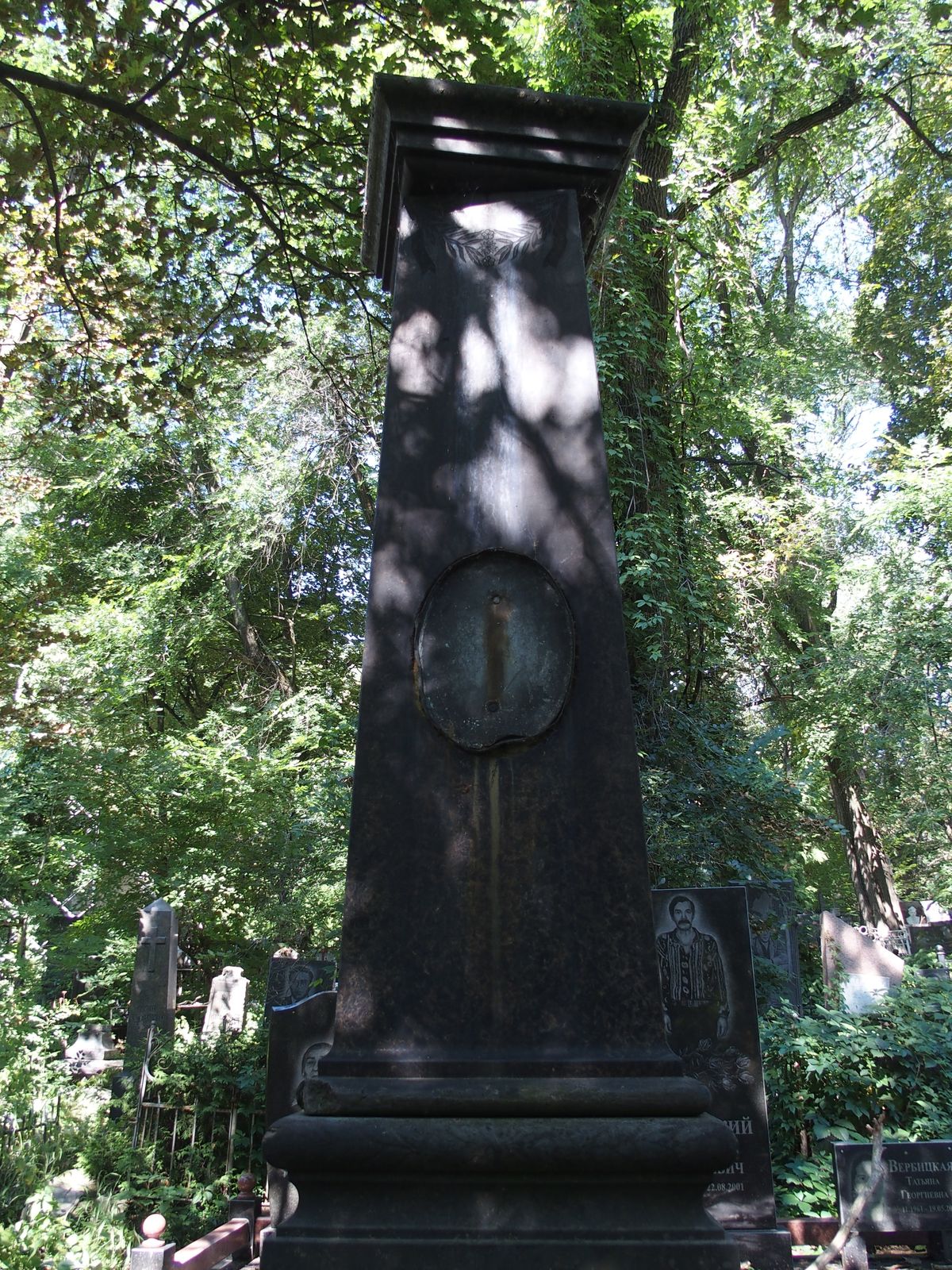 Fragment of a tombstone of Anna Wisniewska, Helena Wisniewska, Konstantin Wisniewski, Bajkova cemetery in Kiev, state in 2021