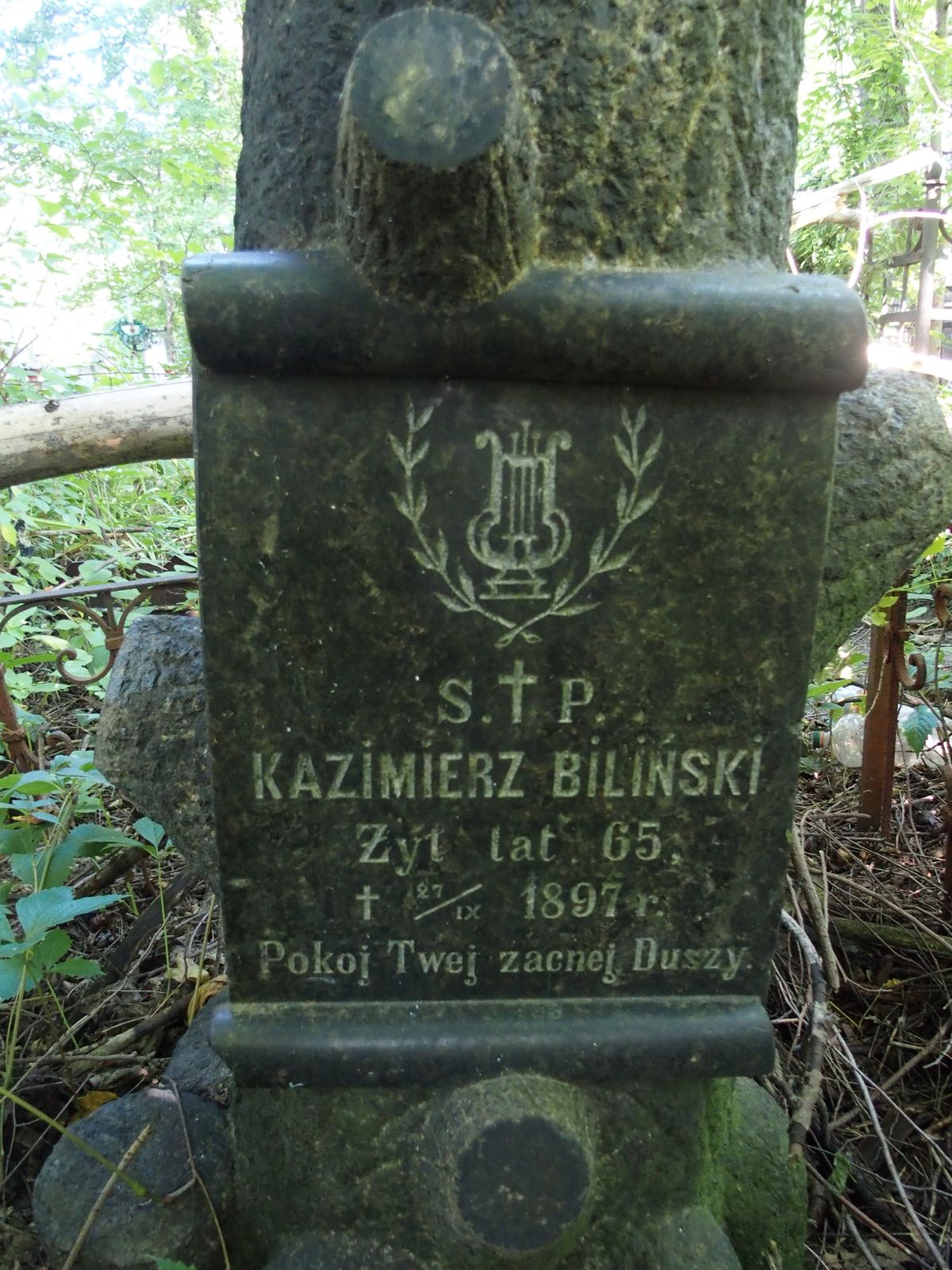 Napis z nagrobka Kazimierza Bilińskiego