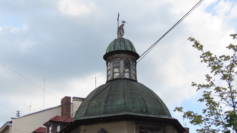 Figure of the Sorrowful Christ on the lantern of the dome of the Boim Chapel in Lviv